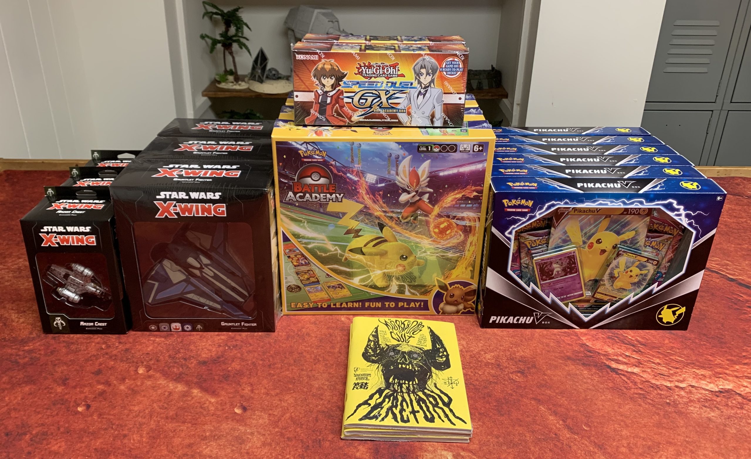 Pokemon, Yu-Gi-Oh!, X-Wing, and Mork Borg